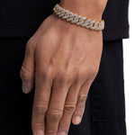 Model wearing 13mm 18k gold ice prong cuban bracelet by Iceman Society