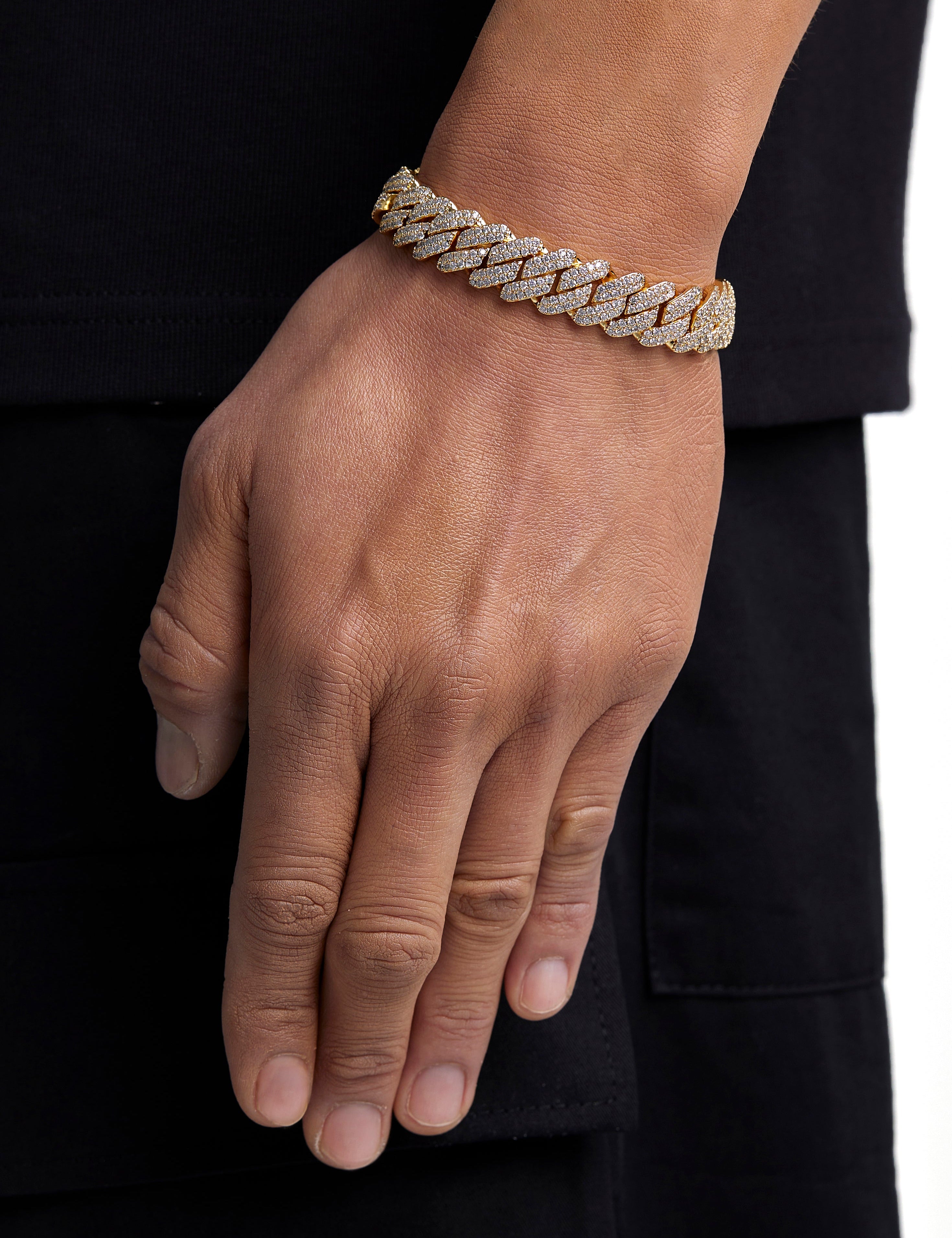 Model wearing 13mm 18k gold ice prong cuban bracelet by Iceman Society