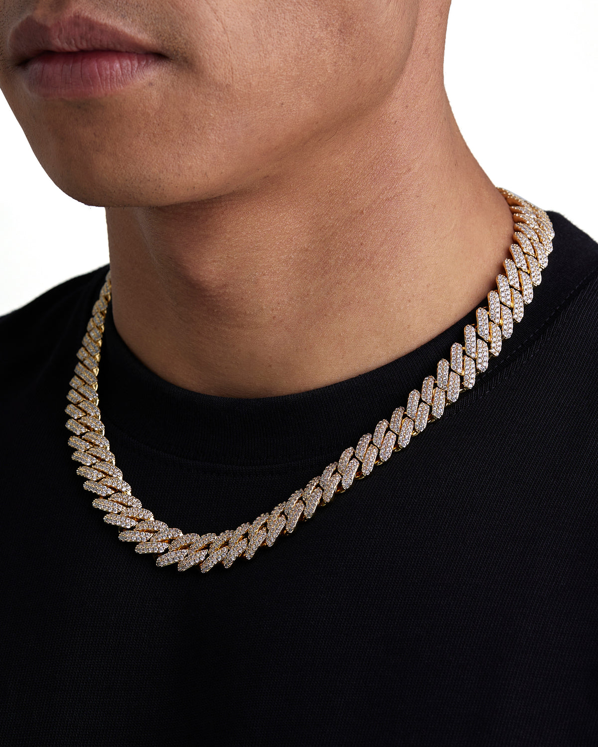 Model wearing 13mm 18K gold ice prong cuban necklace by Iceman Society, side view