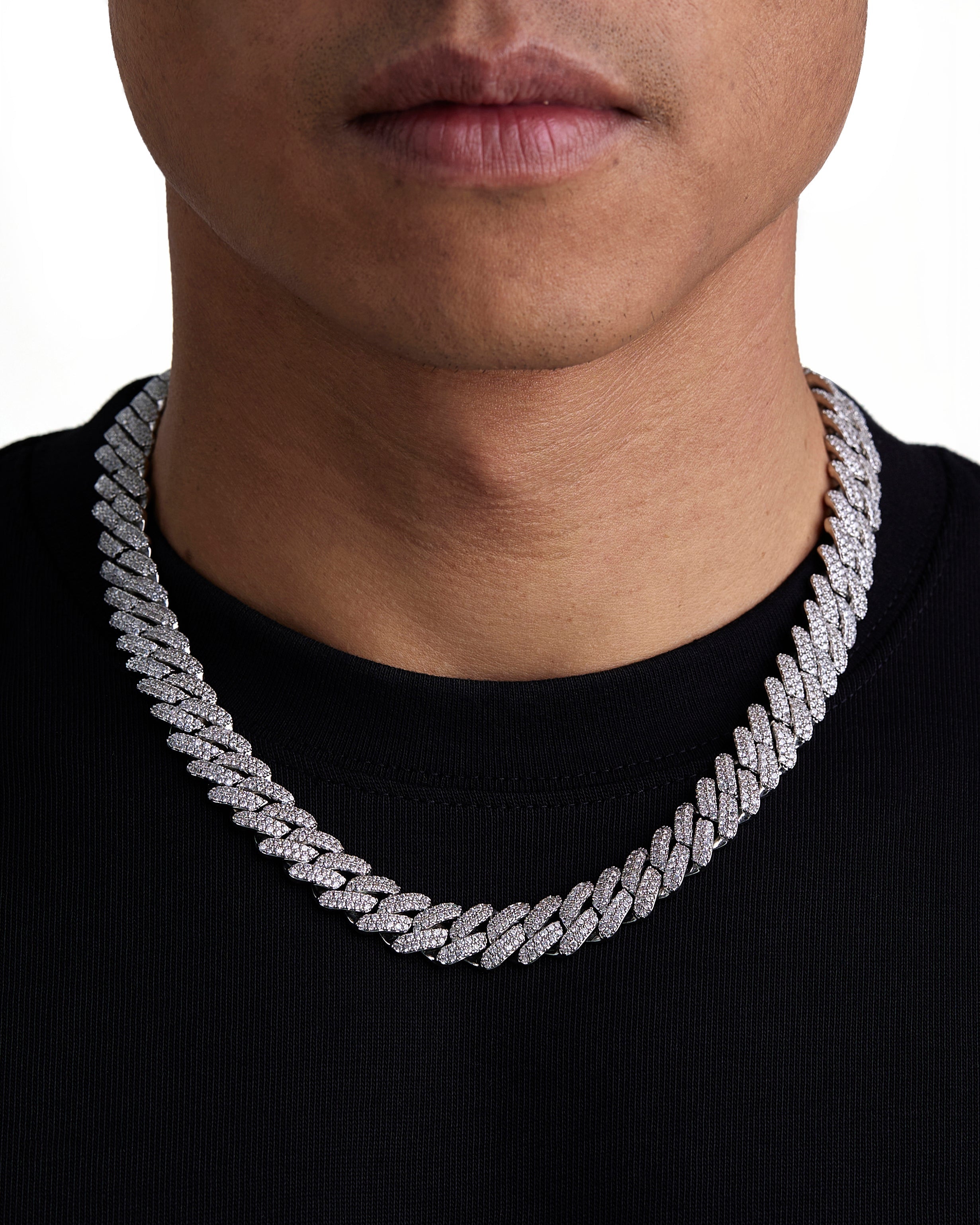 Model wearing 13mm white gold ice prong cuban necklace by Iceman Society, front view