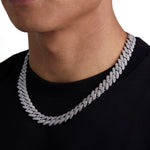 Model wearing 13mm white gold ice prong cuban necklace by Iceman Society, side view
