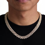 Model wearing 13mm 18K gold ice prong cuban chain set by Iceman Society, front view