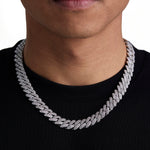 Model wearing 13mm white gold ice prong cuban chain set by Iceman Society, front view