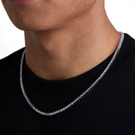 Model wearing 3mm white gold tennis necklace by Iceman Society, side view