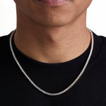 Model wearing 3mm 18K gold ice sparkler tennis chain set by Iceman Society, front view