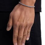 Model wearing 3mm white gold ice sparkler tennis chain set by Iceman Society, side view