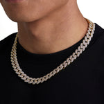 Model wearing 12mm 18K gold iceman cuban necklace by Iceman Society, side view