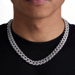 Model wearing 12mm white gold iceman cuban bracelet by Iceman Society