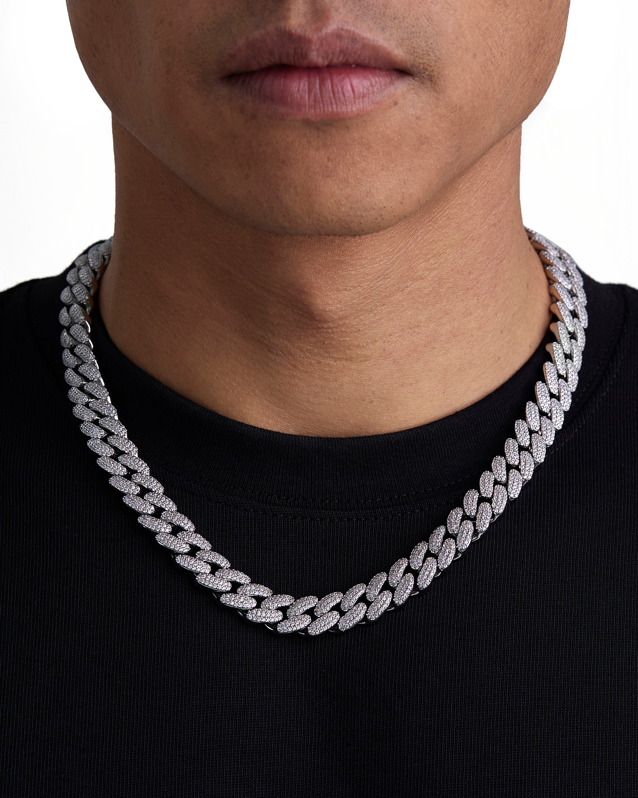 Model wearing 12mm white gold iceman cuban chain set by Iceman Society, front view