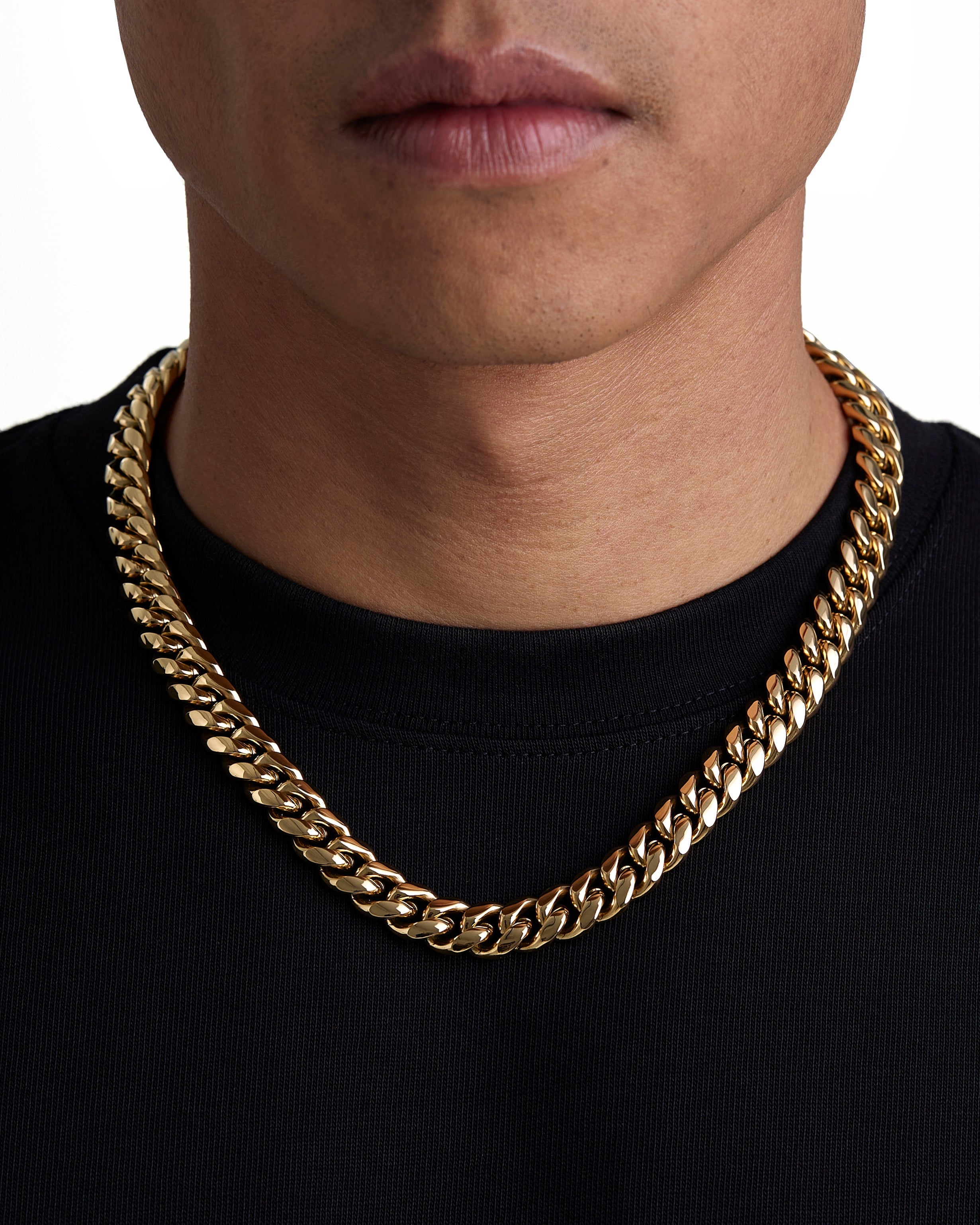 Model wearing 12mm 18k gold plain cuban necklace by Iceman Society