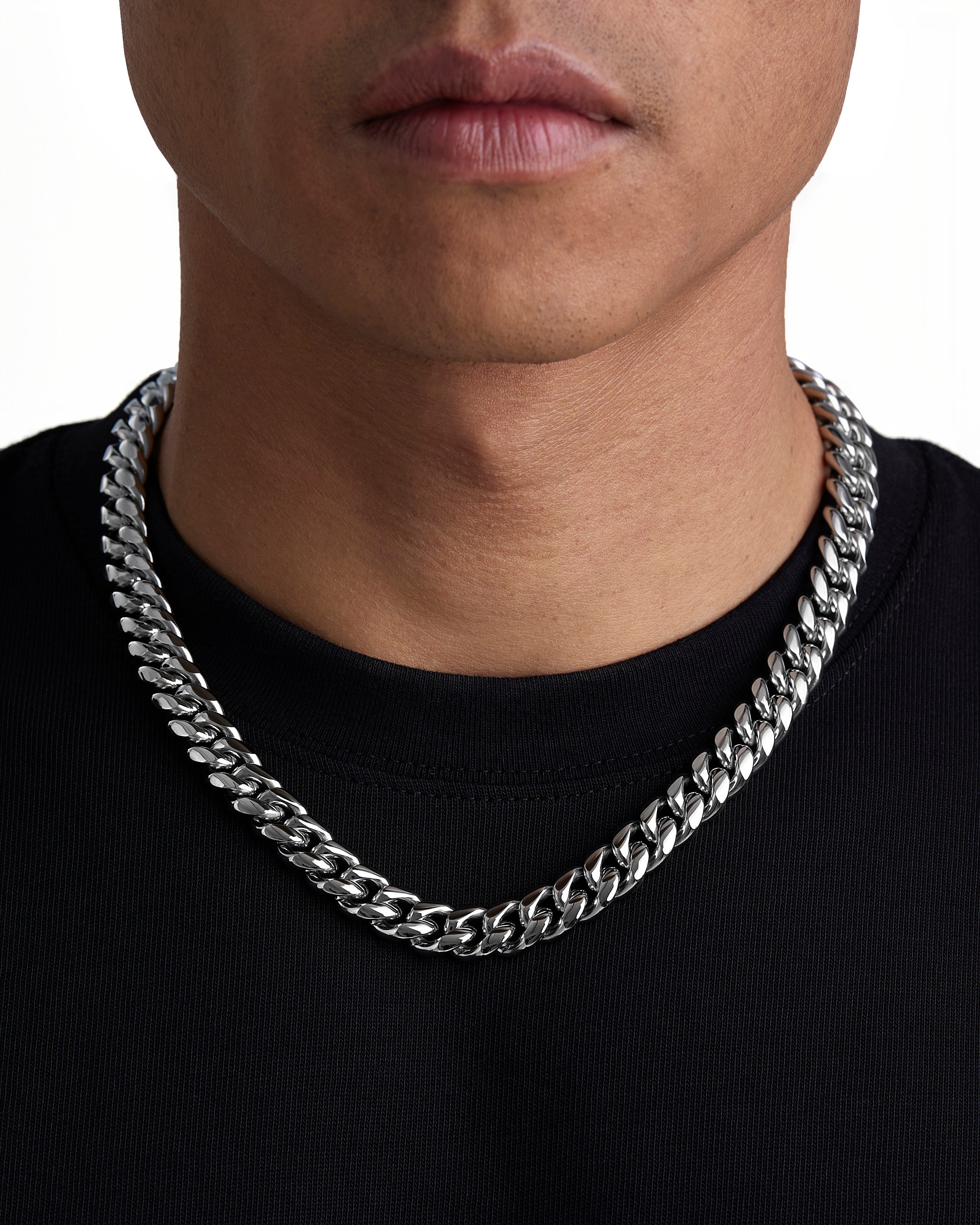 Model wearing 12mm white gold plain cuban necklace by Iceman Society