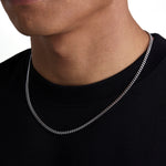 Model wearing 3mm white gold plain cuban necklace by Iceman Society, side view