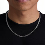 Model wearing 5mm white gold plain cuban necklace by Iceman Society