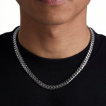 Model wearing 8mm white gold plain cuban necklace by Iceman Society