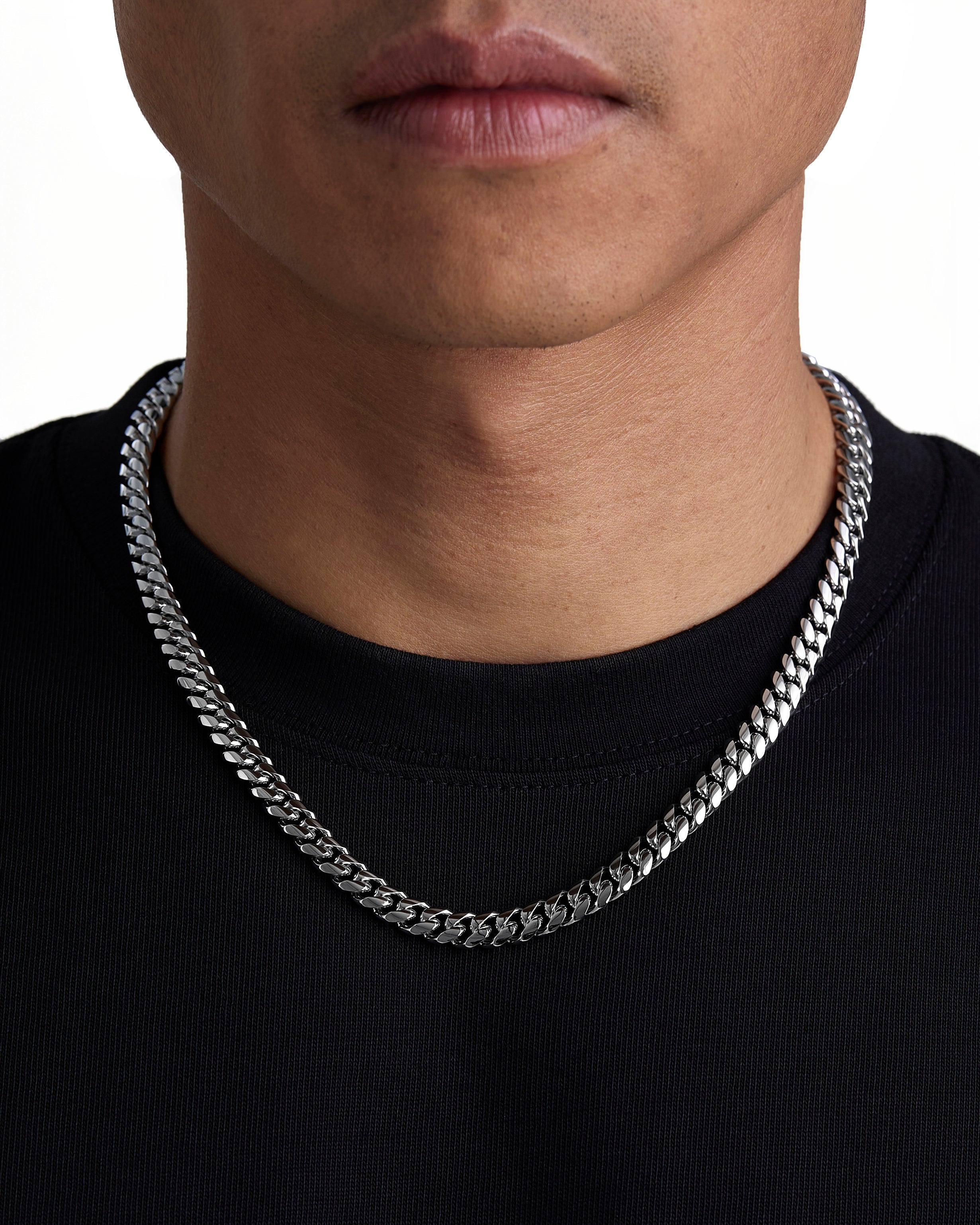 Model wearing 8mm white gold plain cuban necklace by Iceman Society