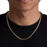 Model wearing 5mm 18K gold plain cuban chain set by Iceman Society, front view