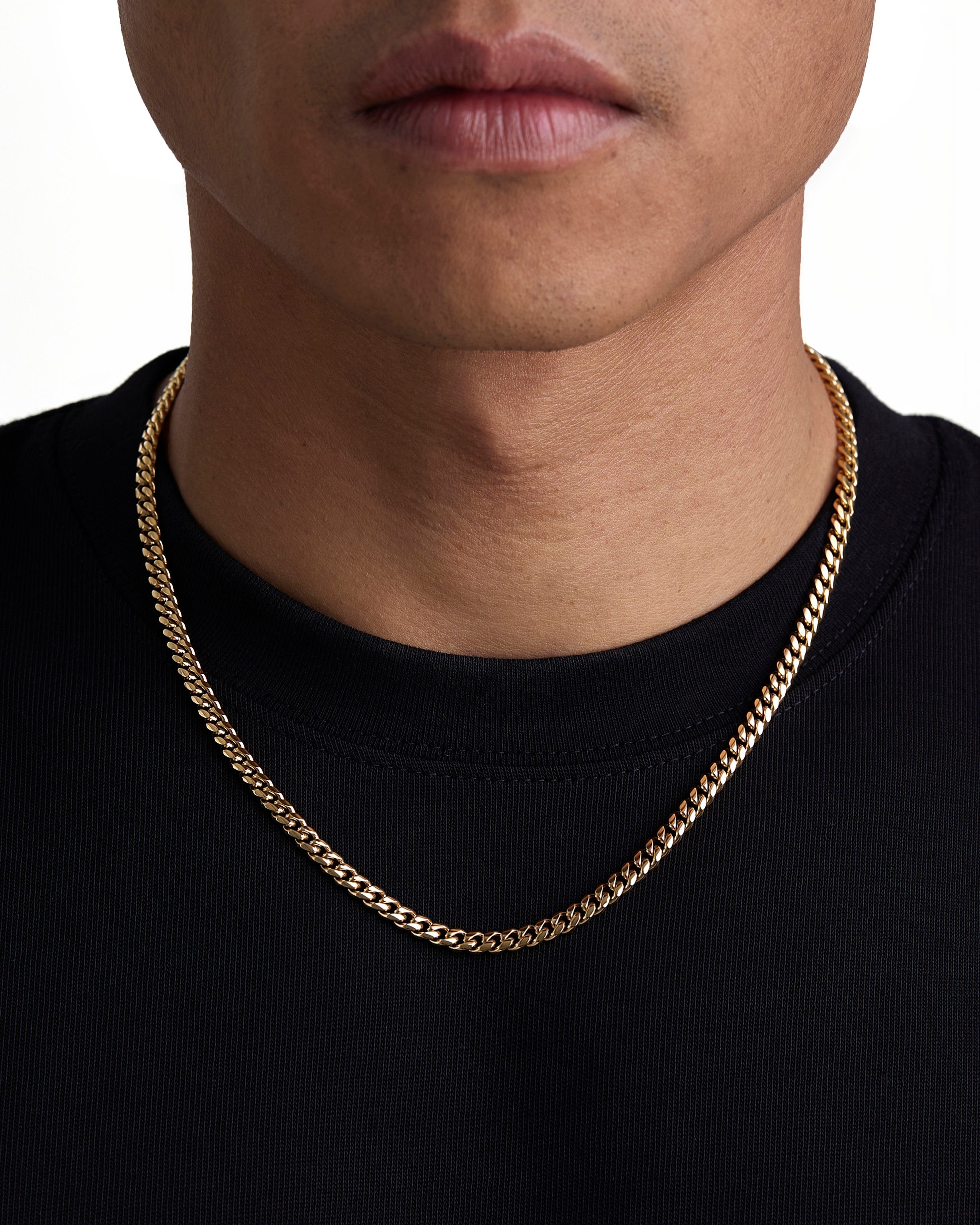 Model wearing 5mm 18K gold plain cuban chain set by Iceman Society, front view