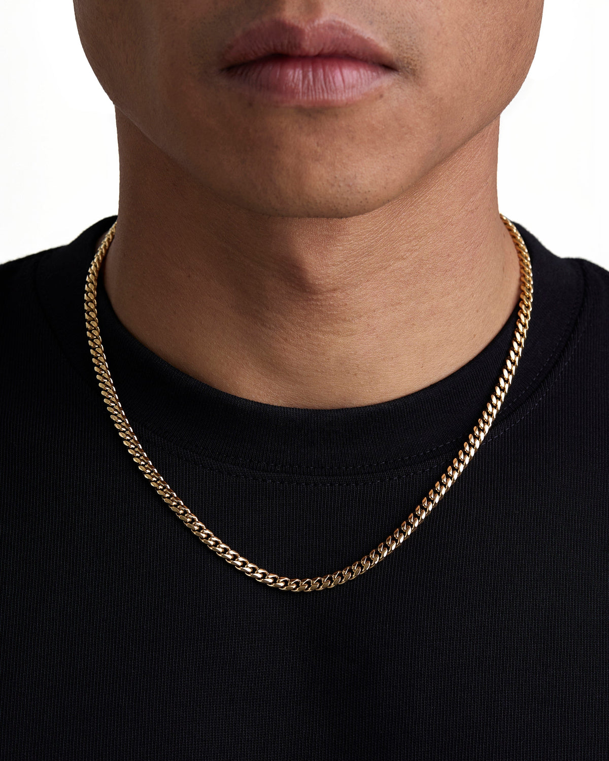 Model wearing 5mm 18K gold plain cuban chain set by Iceman Society, front view