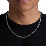 Model wearing 5mm white gold plain cuban chain set by Iceman Society, front view