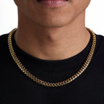 Model wearing 8mm 18K gold plain cuban chain set by Iceman Society, front view