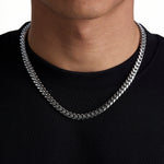 Model wearing 8mm white gold plain cuban chain set by Iceman Society, front view