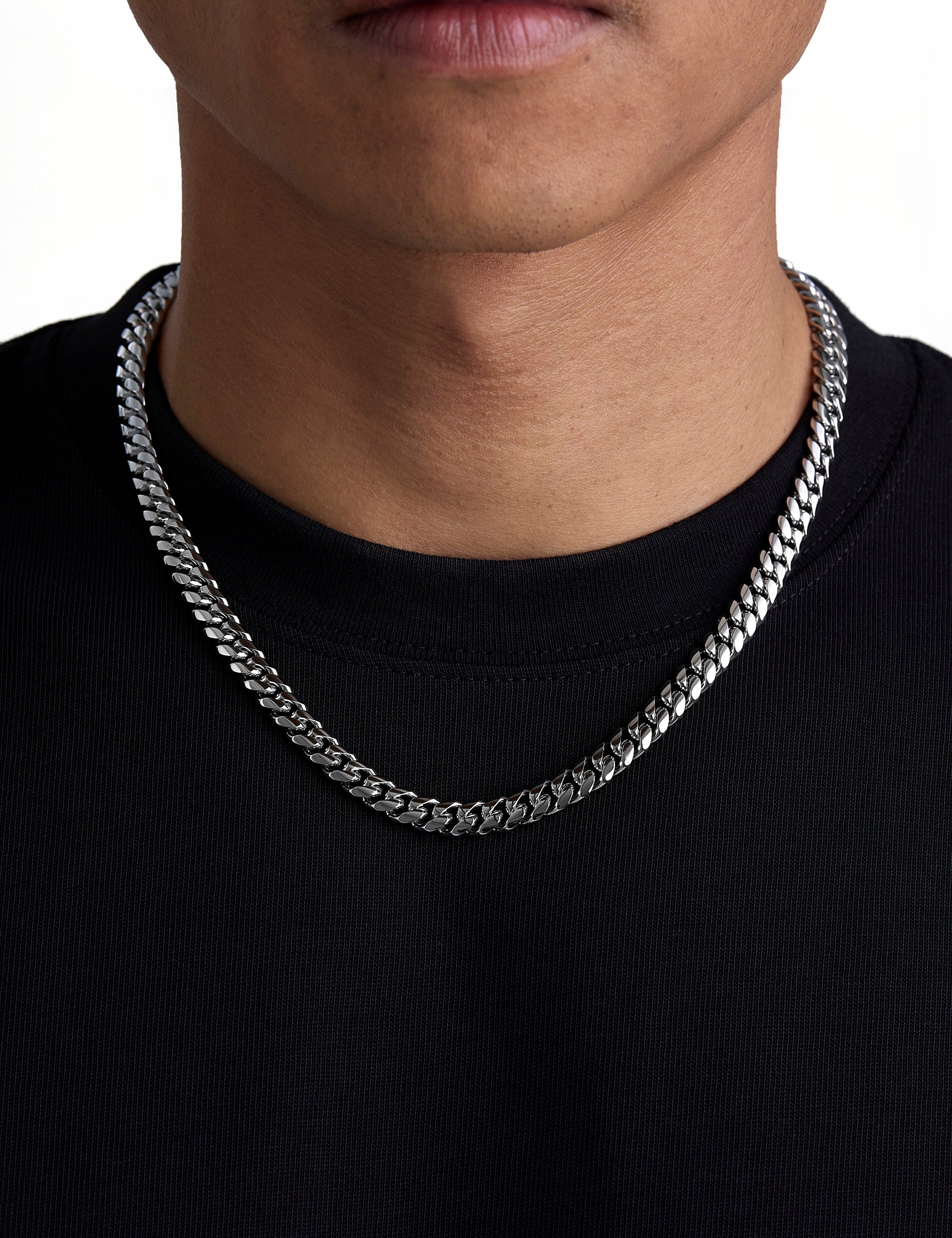 Model wearing 8mm white gold plain cuban chain set by Iceman Society, front view