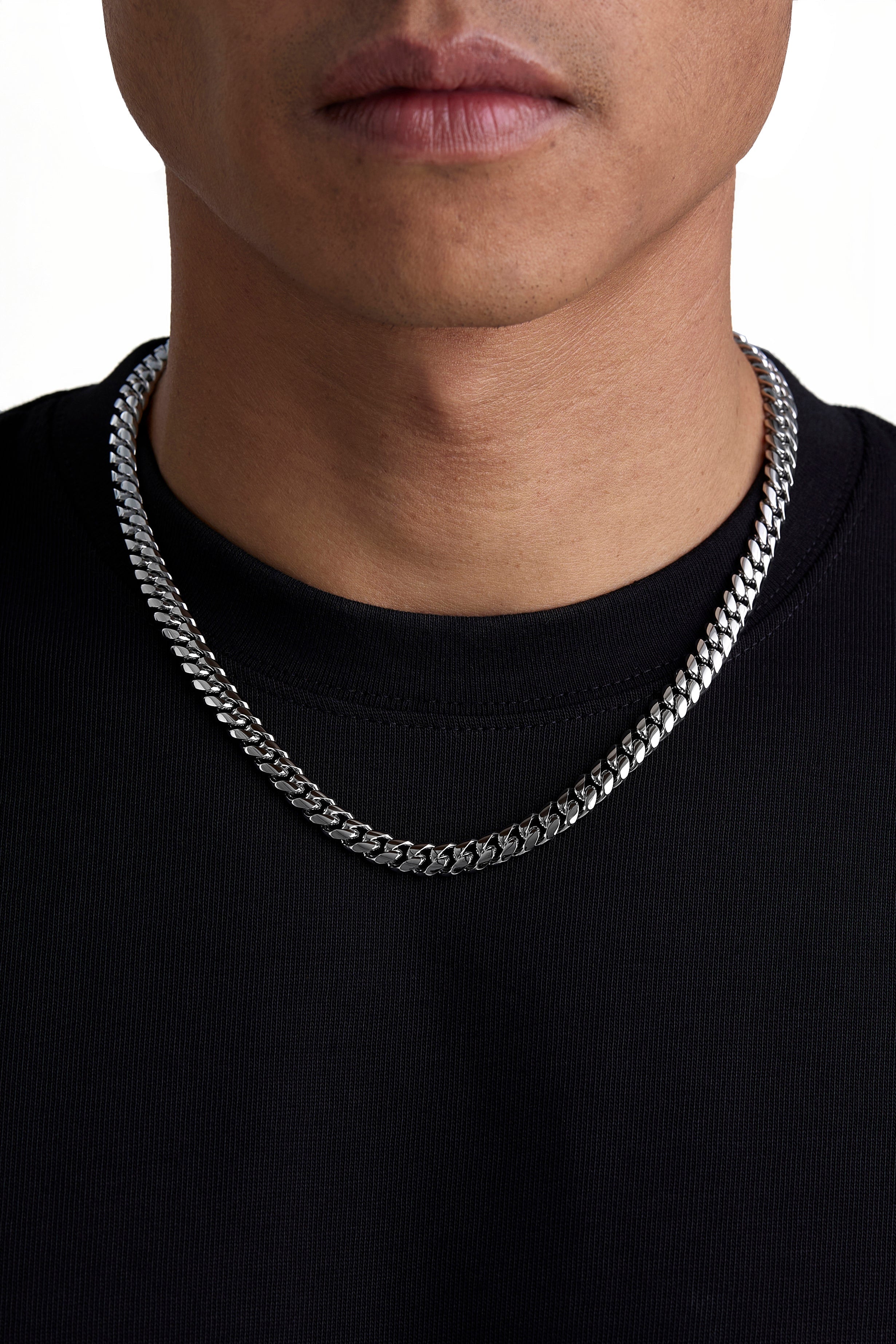 Model wearing 8mm white gold plain cuban chain set by Iceman Society, front view