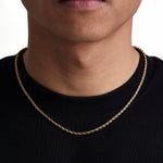 Model wearing 3mm 18k gold rope necklace by Iceman Society, front view