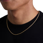 Model wearing 3mm 18k gold rope necklace by Iceman Society, side view