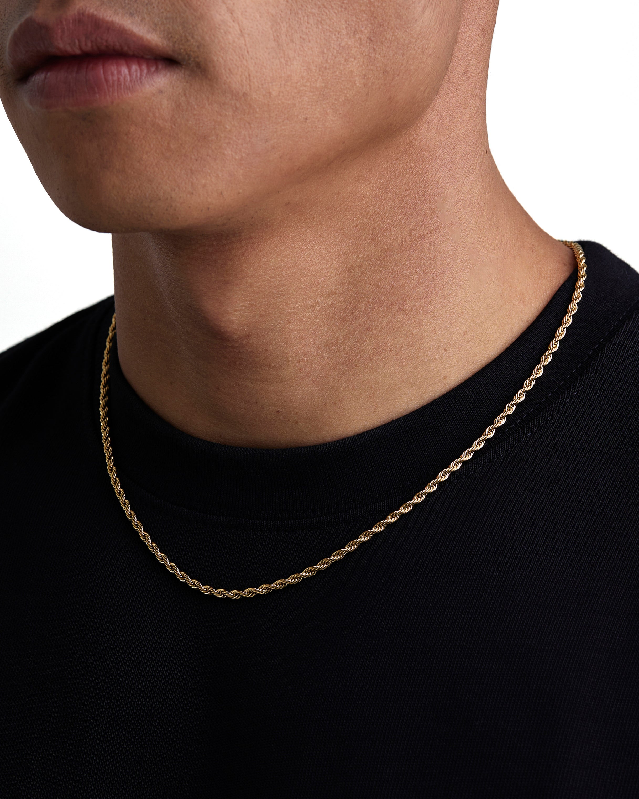 Model wearing 3mm 18k gold rope necklace by Iceman Society, side view