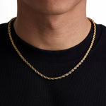 Model wearing 4mm 18k gold rope necklace by Iceman Society, front view