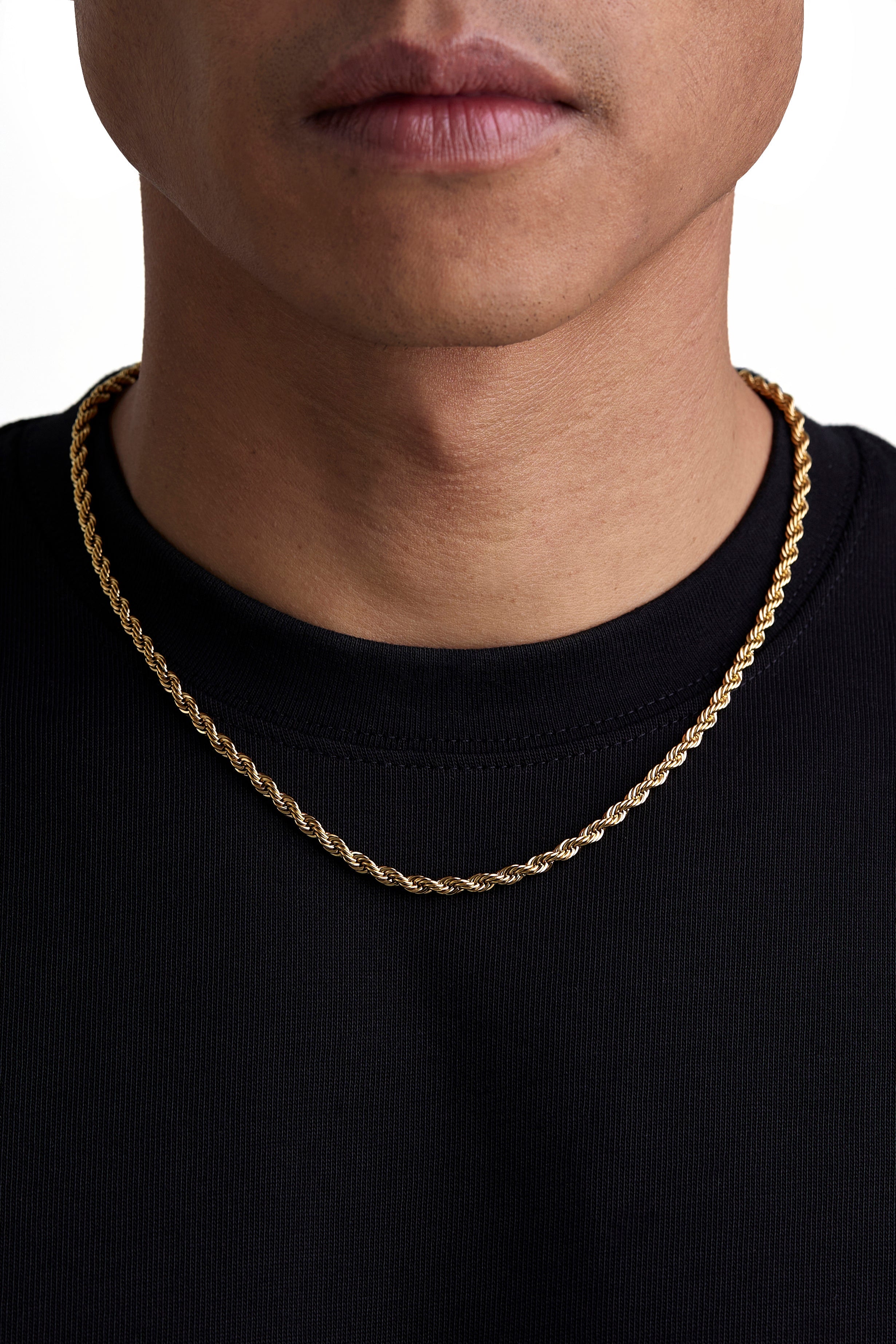Model wearing 4mm 18k gold rope necklace by Iceman Society, front view