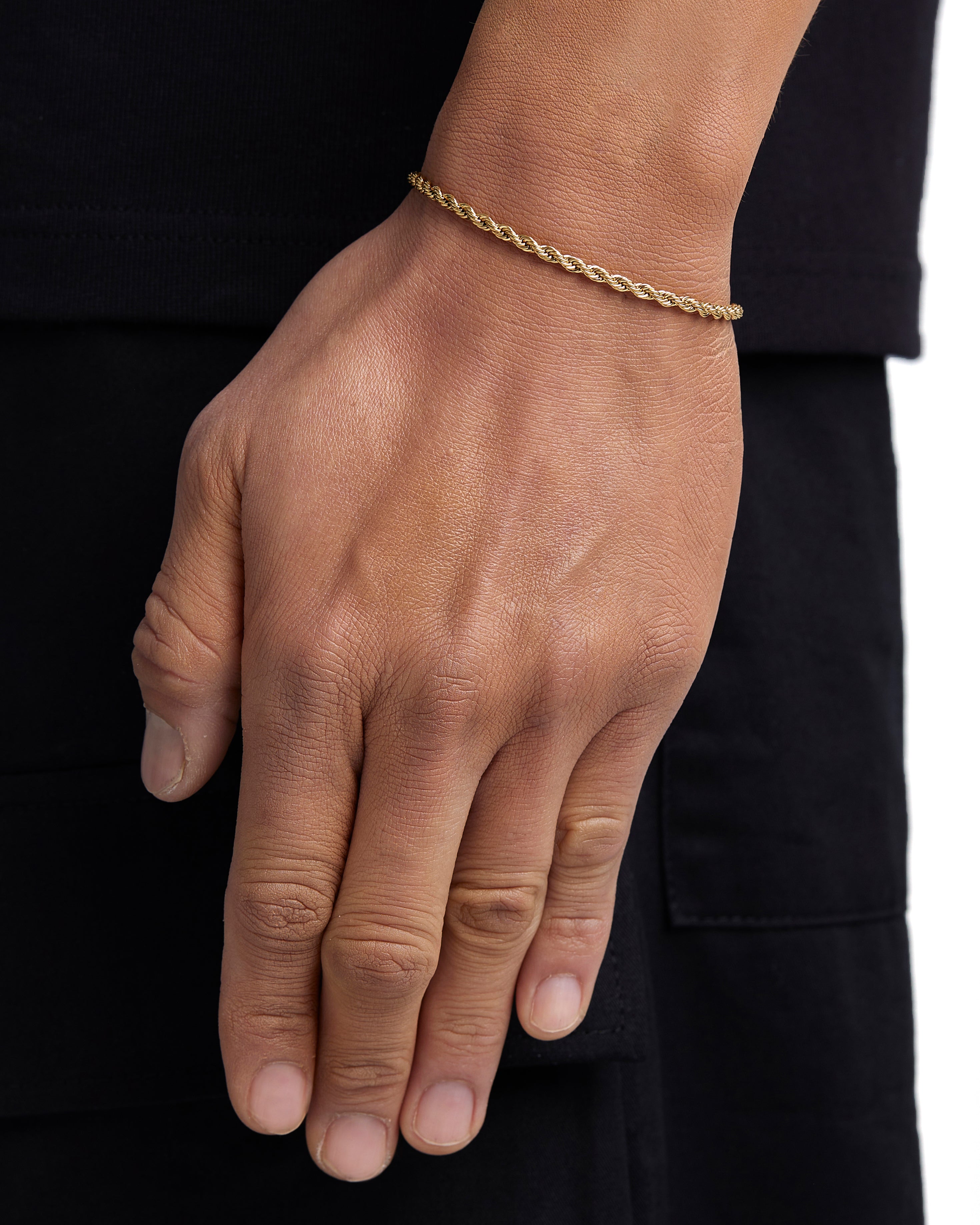 Model wearing 3mm 18k gold rope chain set by Iceman Society, side view