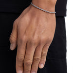 Model wearing 3mm white gold rope chain set by Iceman Society, side view