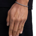 Model wearing 4mm white gold rope chain set by Iceman Society, side view