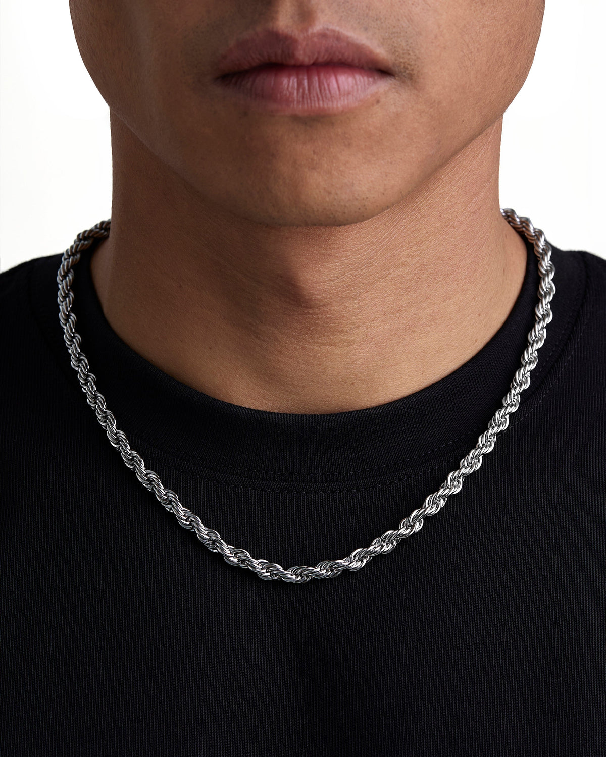Model wearing 6mm white gold rope chain set by Iceman Society, front view
